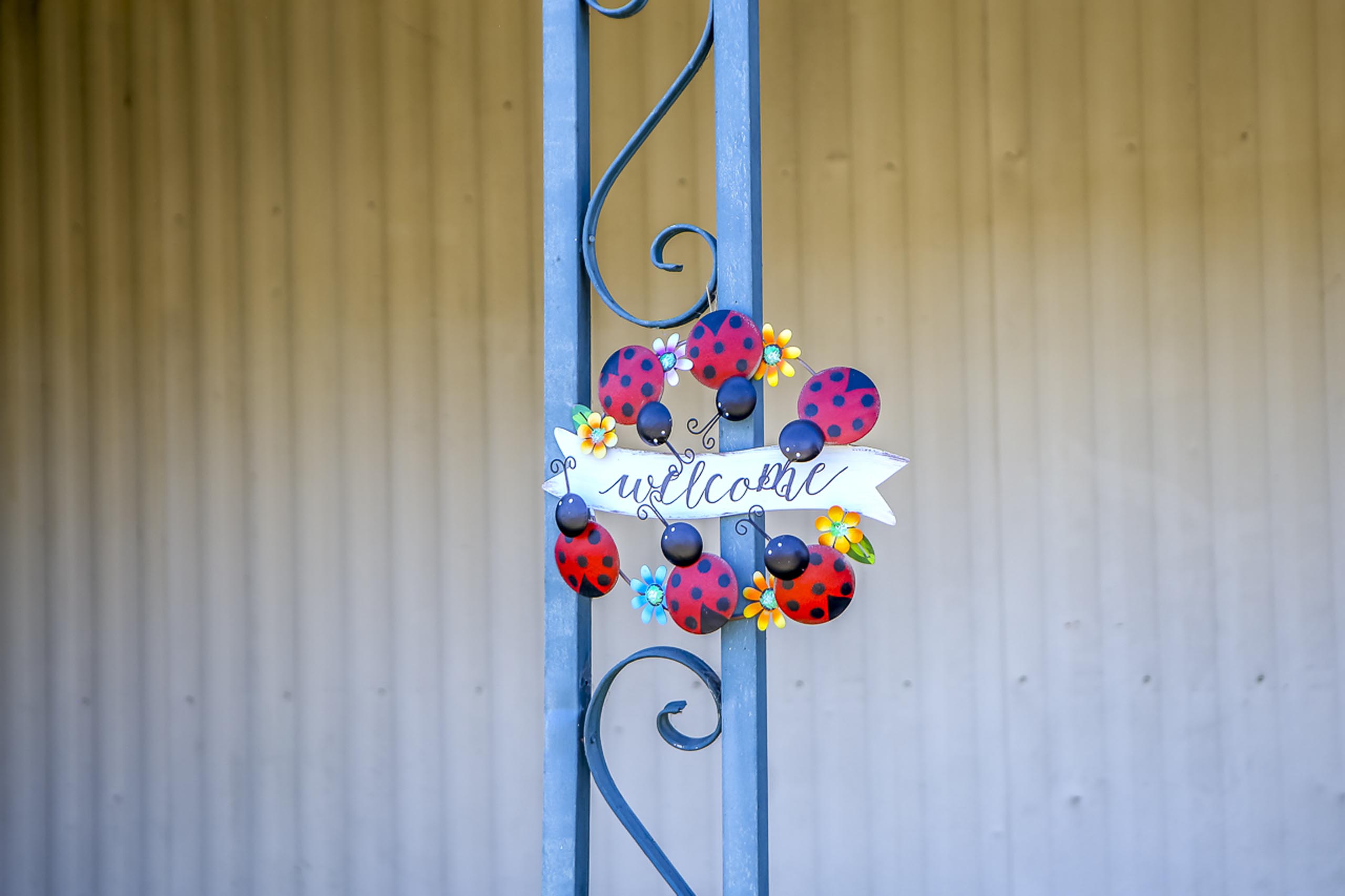 floral 'welcome' house decoration in condesa village mobile home park bellflower, california